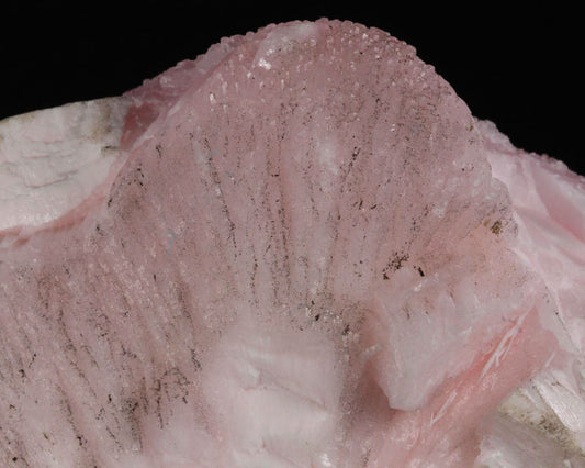 What are the pink crystals? What is the meaning of Manganoan calcite?