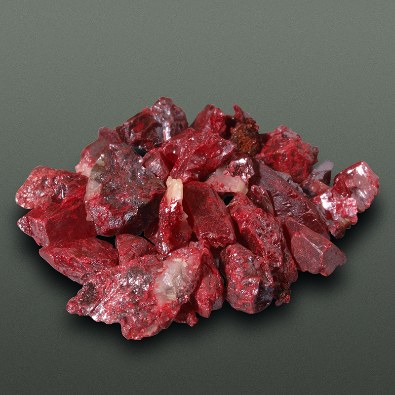 What are the red crystals? What is the meaning of Cinnabar and Garnet?