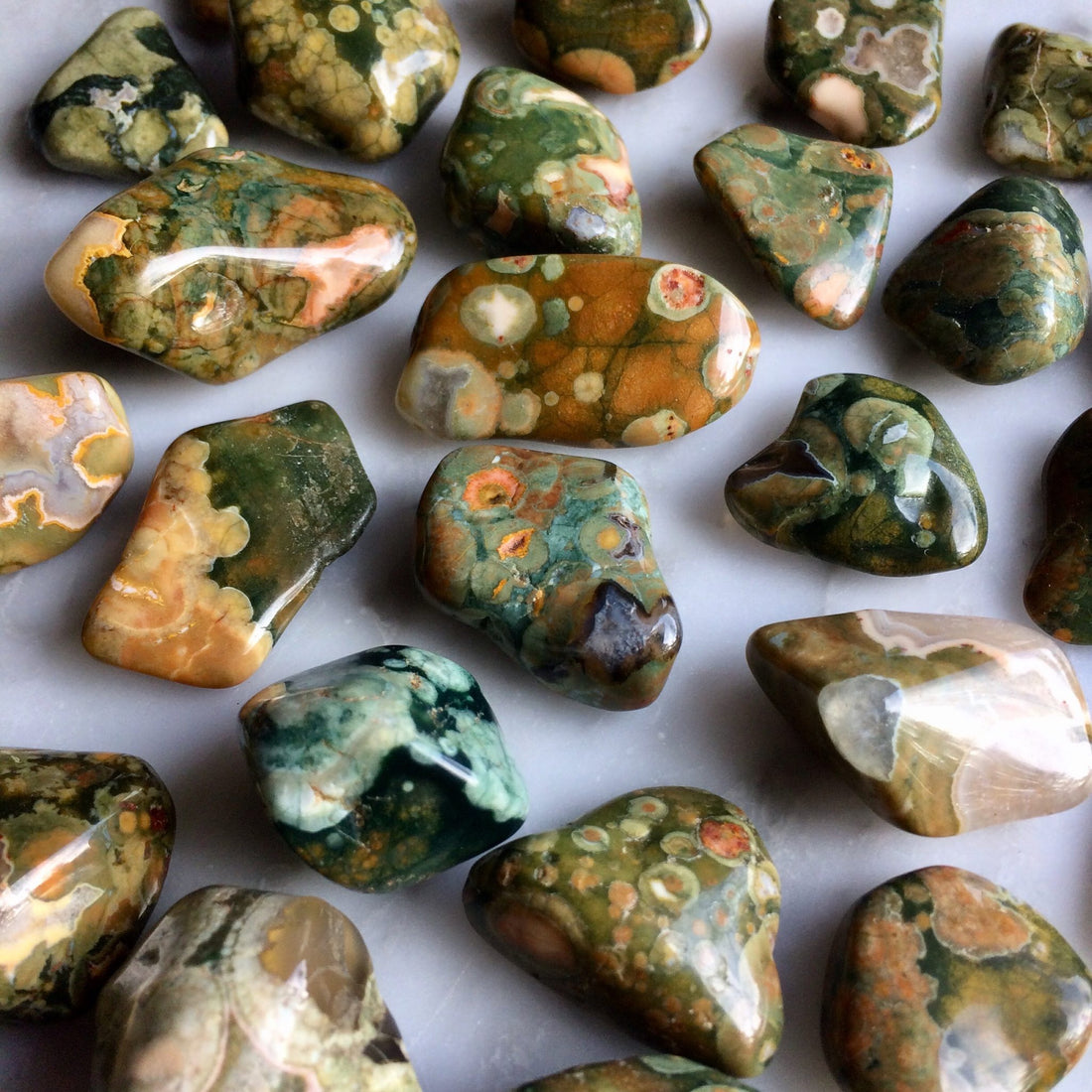 What is the meaning of Rainforest rhyolite? What is the meaning of Bloodstone?