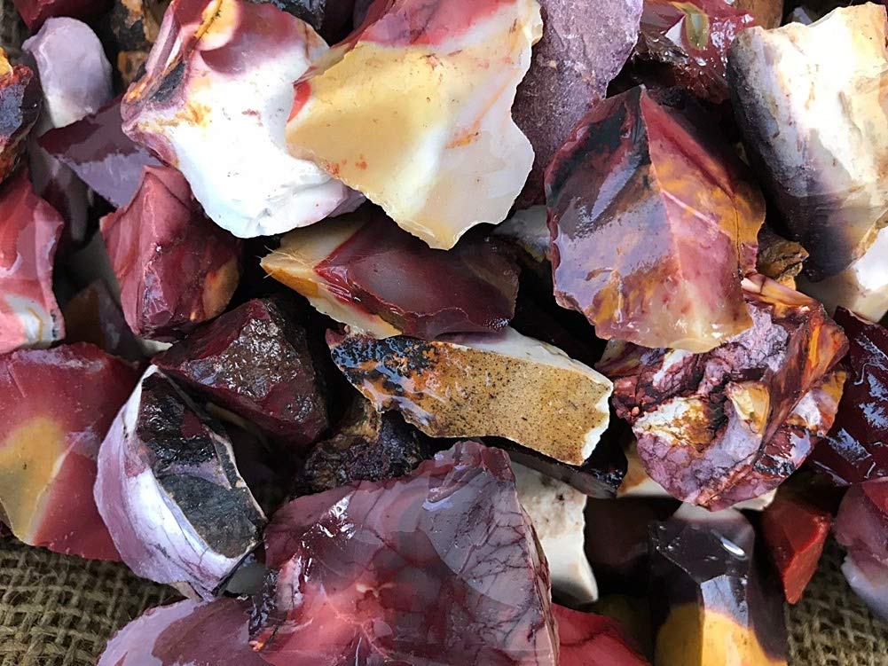 What are the red crystals? What is the meaning of Mookaite and Spinel?