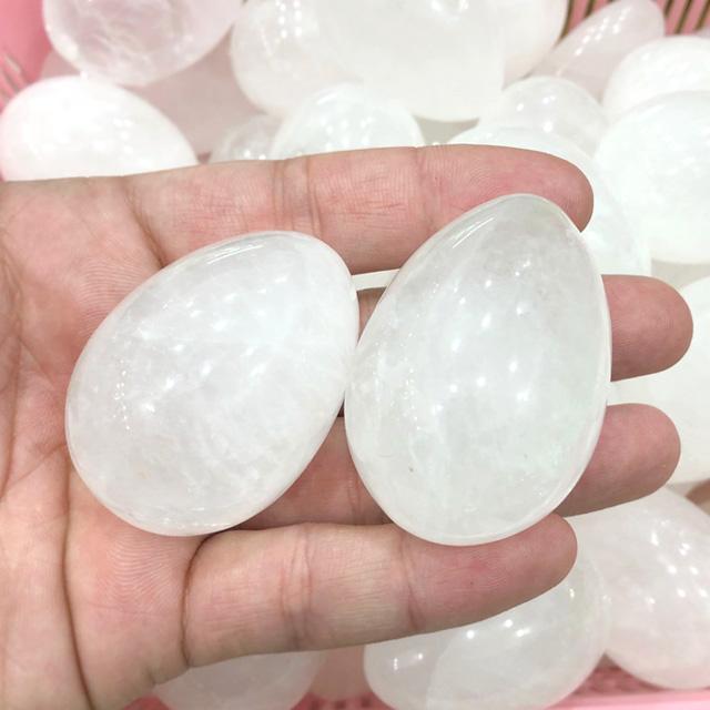 Polished natural healing white quartz crystal stone egg for sale